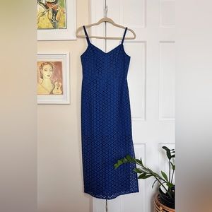 Agitator Dress in blue embroidery cotton fabric.
